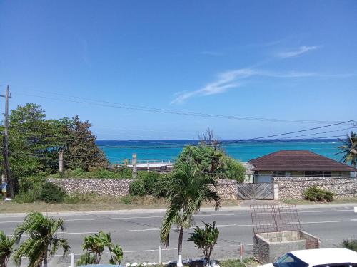 Discover Paradise: Budget Studio Beach Condo Beckons on Jamaica's North Coast!