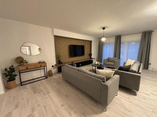 140qm - 4 Zimmer- Parkplatz - Autobahn - blauer See - MalliBase Apartments in Garbsen, Deutschland