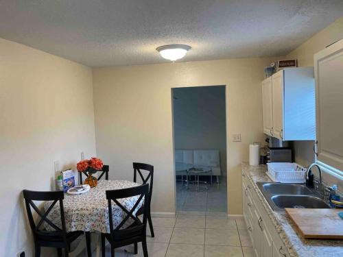 Private Queen Bedroom B house shared common spaces in Fort Pierce, USA