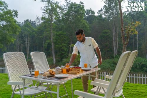 Mudra Manor- River View Villa with Comp Breakfast, Heated Pool and Jacuzzi by StayVista photo 3