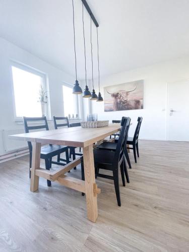 Koplietošanas atpūtas telpa ar TV, Ferienzimmer auf dem Hof Postma in Lambrechtshagen