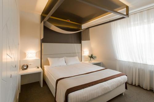 UNO Design Hotel Stop at UNO Design Hotel to discover the wonders of Odessa. The hotel offers guests a range of services and amenities designed to provide comfort and convenience. Service-minded staff will welcome and