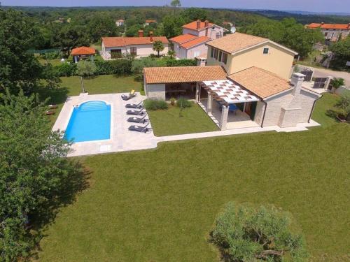 Ferienhaus mit Privatpool für 8 Personen ca 175 qm in Hrboki, Istrien Bucht von Raša