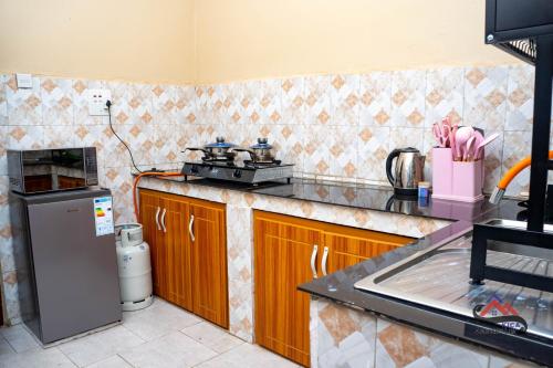 Palvelut, Kica Apartment with Airconditioned bedrooms in Lira, Uganda in Lira