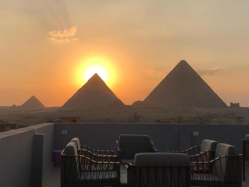 Pyramids Sun Land Veiw - Tap to explore photos