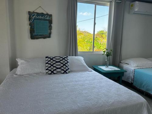 1 queen bed, 1 double bed, 1 twin bed