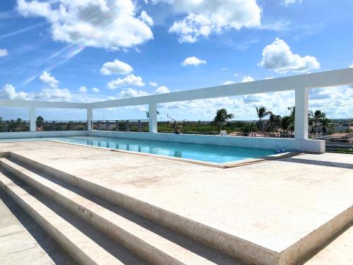 CARAIBICO SUITES Rooftop Pool & Beach Club