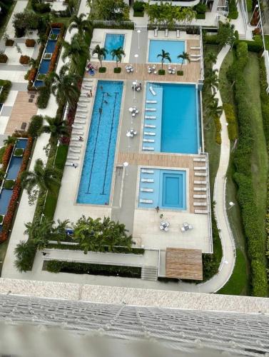 Apartamento Barra da Tijuca Riocentro Ilha Pura Parque olímpico Rock in Rio 2024 piscina aquecida