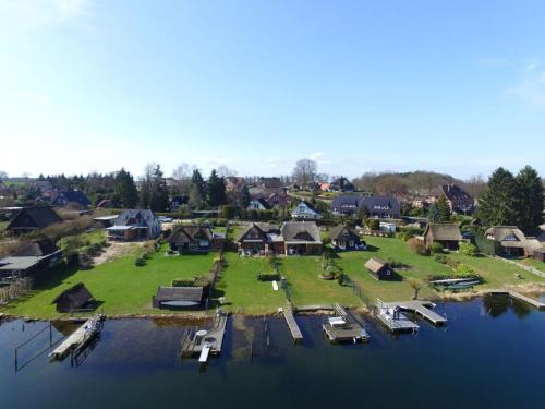 Attractive holiday home by the lake