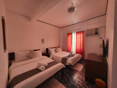 Sunvilla beachfront hotel Room Type - Quadruple Room