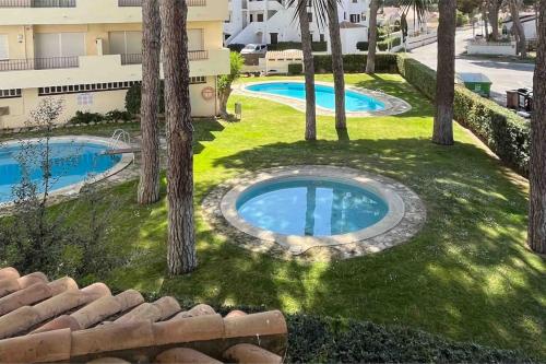 Apartamento en la Escala con piscina y parking