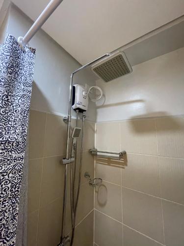 Grass Residences Charming Staycation - Tap to explore photos