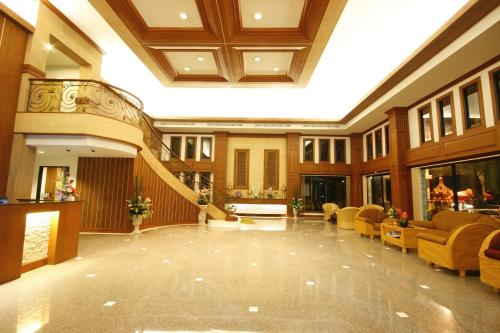Chiangrai Grand Room Hotel. in San Sai