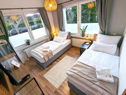 BesTime - 5 Schlafzimmer, Wohnzimmer, Kuche, Waschtrockner, Terrasse, Smart-TVs, Netflix, Tischfußba in Wildeshausen