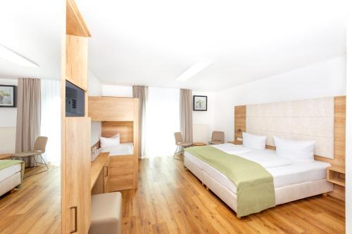 Hotel & Gästehaus Im Ziegelweg KLIMATISIERT Eintrittskarten für den Europa-Park erhalten Sie garantiert über uns, Руст (фото 7)