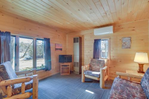 Lakefront Park Rapids Cabin with Resort Amenities! in Arago, USA