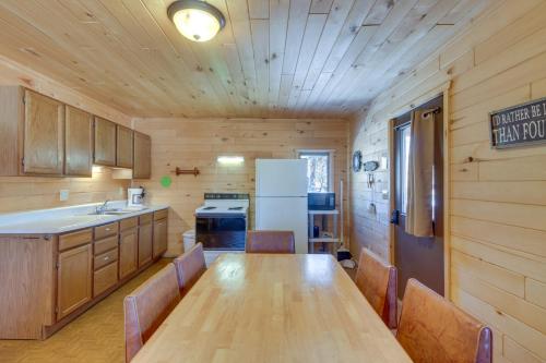 Lakefront Park Rapids Cabin with Resort Amenities! in Arago, USA