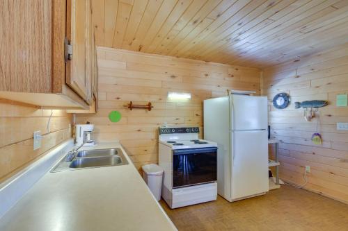 Lakefront Park Rapids Cabin with Resort Amenities! in Arago, USA