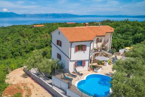 Apartments with a swimming pool Drenje, Labin - 22992