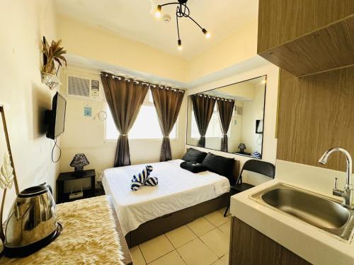 Great View@Fully Equipped Condo w/ WiFi NETFLIX @the Metro, Manila