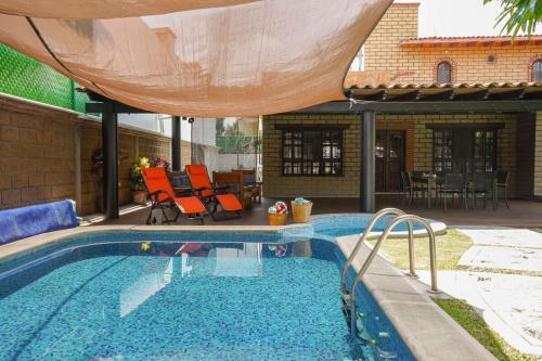 Amazing family house in Oaxtepec Pool & Hot tub in Oaxtepec, Mexico
