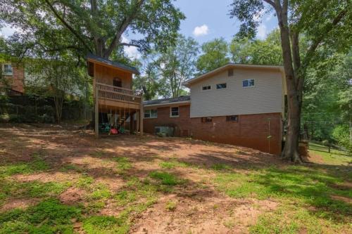 Large Yard with Treehouse Tri-Level Retreat