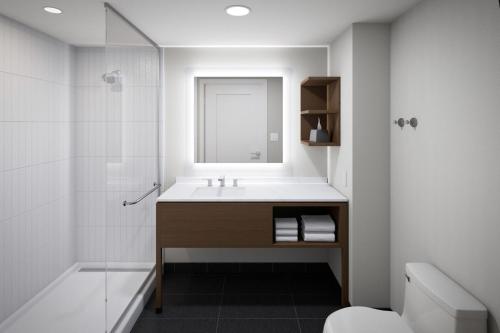 One-Bedroom King Suite with Communications and Mobility Accessible Roll-In Shower