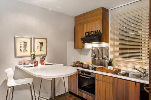 kuhinja, Feeling Home Lugano - Happy Rentals in Canobbio