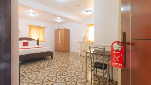 RedDoorz @ Moss Hotel Guevarra Dasmarinas, Mendez