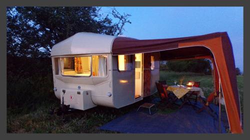 Retro Caravan with Mountain Views