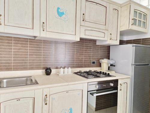 Dommos Limone - Appartamenti in residence con piscina