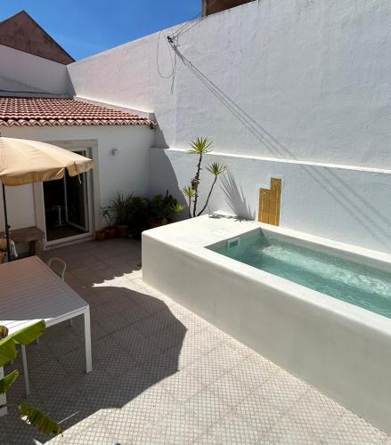 Zwembad, Palmeirinha Guest House in Ribeira de Sintra