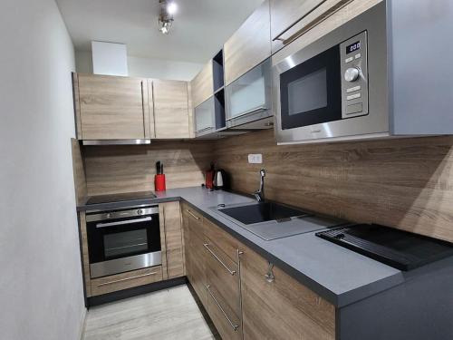 Kitchen, Apartman Refrino na jedinecnem miste in Rokytno