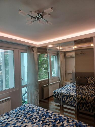 Signature Suite - 1 Bedroom by Flat Manаger - Tap to explore photos