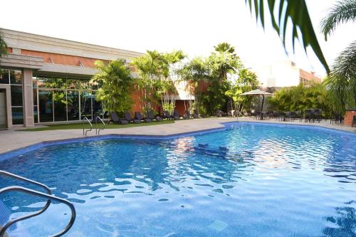 Swimming pool, Hotel GH Guaparo Inn Valencia in El Vinedo Valencia