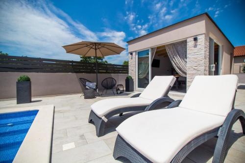 Beautiful newly built holiday house with two separate units with private pool in Becici