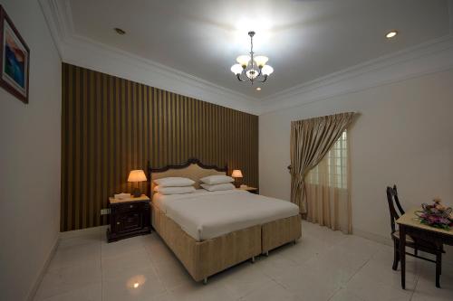 Royal Residence Hotel Apartments Room Type - Three-Bedroom Villa