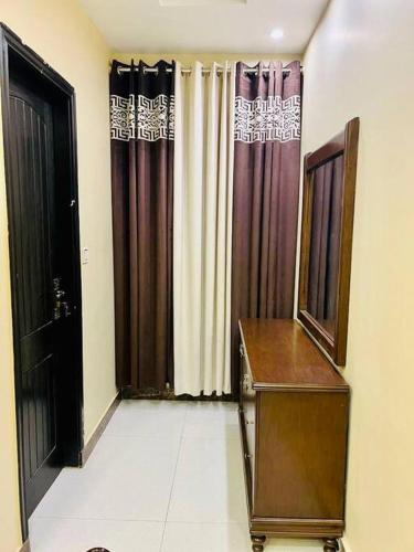 Bahria Town Lahore - NEXT INN Two Bedroom condo with free parking 203 - image 2