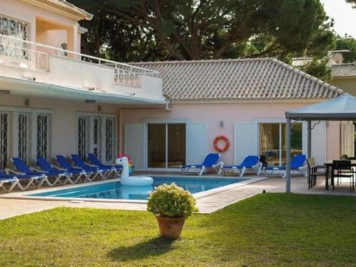 Swimming pool, Vilamoura Golf Mansion by Stay ici Algarve Holiday Rental in Quarteira