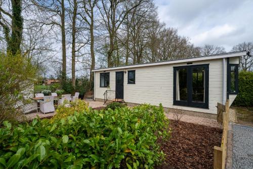 Vista exterior, Stijlvol, rustig chalet midden in de Veluwse natuur mét weidezicht (Stijlvol, rustig chalet midden in de Veluwse natuur met weidezicht) in Epe