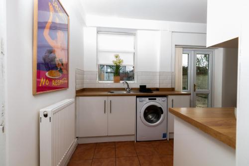 Kitchen, Stylish Comfort: 2BR Home in the Heart of Wigan in Wigan