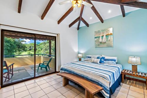 Inviting Home with Colorful Decor and Private Backyard Oasis with a Swimming Pool & Shaded Terrace in พอเทรโร่
