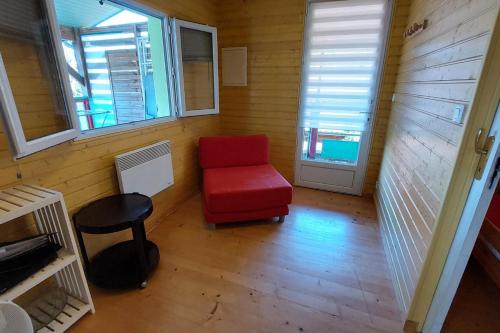 Maison en bois 4 personnes sur lac, Cantal