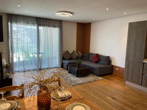 Shared lounge/TV area, Brand new, Stylish & Well located Apartment in Casa-Marina 12 in Sour Jdid