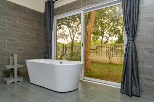 חדר אמבטיה, amber Villas - Fahari Residence in מלינדי