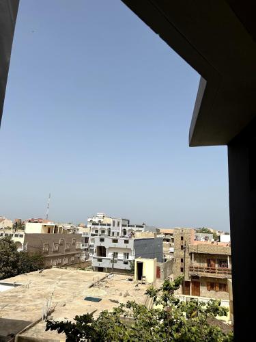 Chambre spacieuse climatisee - SDB privee & Cuisine equipee & Breakfast in Saint Louis