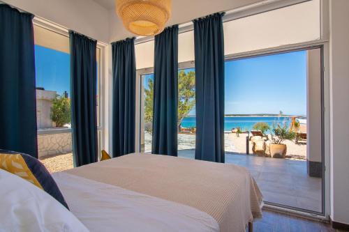 Seaside house for families with children Mandre, Pag - 22604 in Kolan