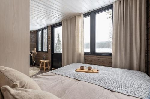 PUOLUKKA Lapland Riverside with Sauna Fireplace BBQ WiFi Ski Ylläs PetsOK