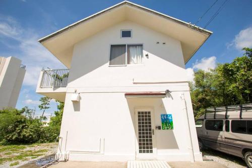 오키나와 본섬 沖縄といえばココ！！美ら海水族館徒歩圏内！ビーチにBBQに星空観察　隠れ家的貸切一軒家 (沖縄といえばココ！！美ら海水族館徒歩圏内！ビーチにBBQに星空観察　隠れ家的貸切一軒家) 2성급 싱글룸 레스토랑