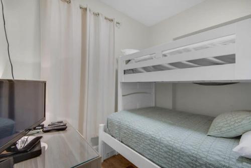 Brightly Furnished Beachfront Condominium - main image
